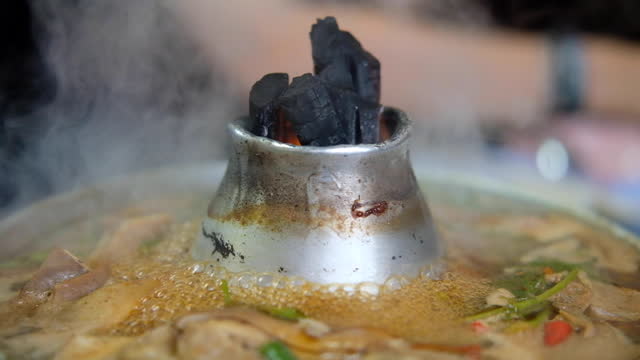Thai style stainless steel hot pot with flame