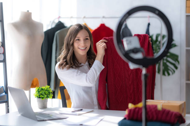 istock Owner woman is doing a live broadcast selling clothe. 1510680665