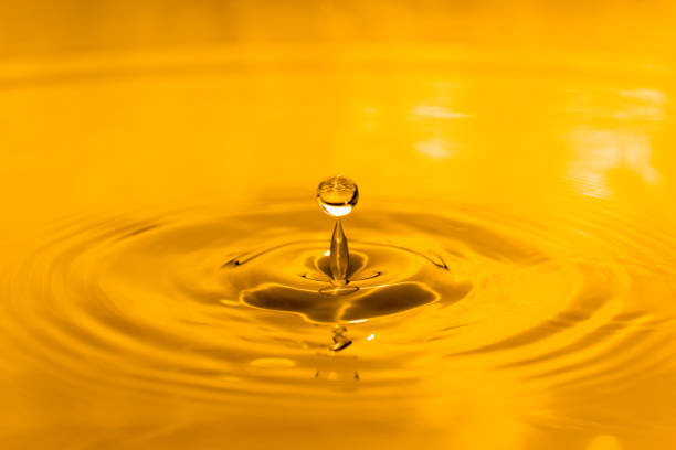 Golden waterdrop splashing.