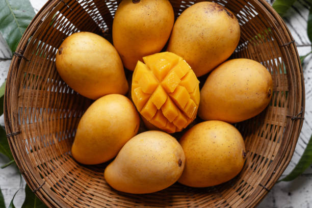 istock yellow ripe mangoes in basket 1510681889