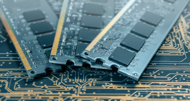 istock computer memory modules on background of black printed circuit board with golden wires 1510701852