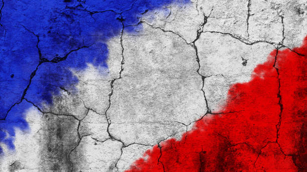 istock Horizontal creative backgrounds of slanting diagonal tricolor stripes or bands, in bright blue, white, vibrant red colors as in National French Flag of France painted on rough uneven textured effect grunge rustic cracked peeling off weathered wall surface 1510717114