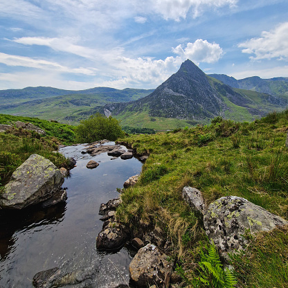 Rising proudly in the heart of Snowdonia National Park, Tryfan stands as a striking symbol of rugged beauty and exhilarating adventure. This iconic peak in North Wales beckons outdoor enthusiasts and mountaineers with its distinctive silhouette and challenging ascent.