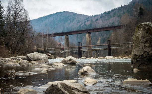 istock landscape in Carpathian mountains with river and railway bridge 1510781354
