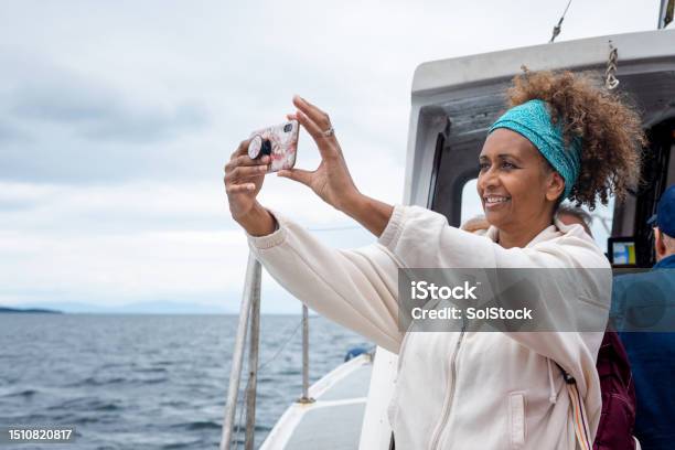 At One With The Ocean Stock Photo - Download Image Now - 55-59 Years, Admiration, Adult