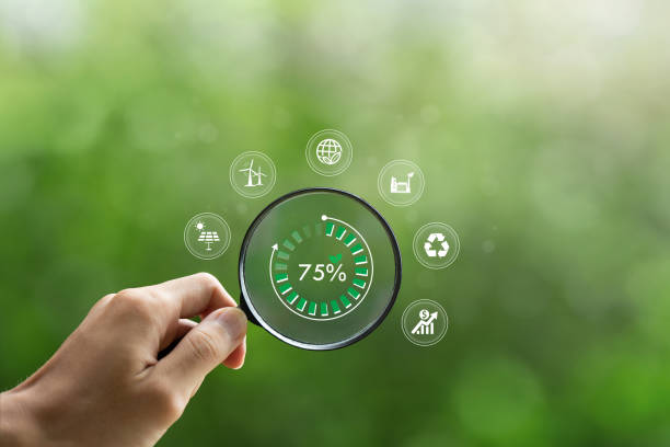 istock hand holding magnifying glass with CO2 reduction icon inside.A clean and friendly environment without carbon dioxide emissions.carbon credit to limit global warming from climate change.carbon neutral. 1510825151