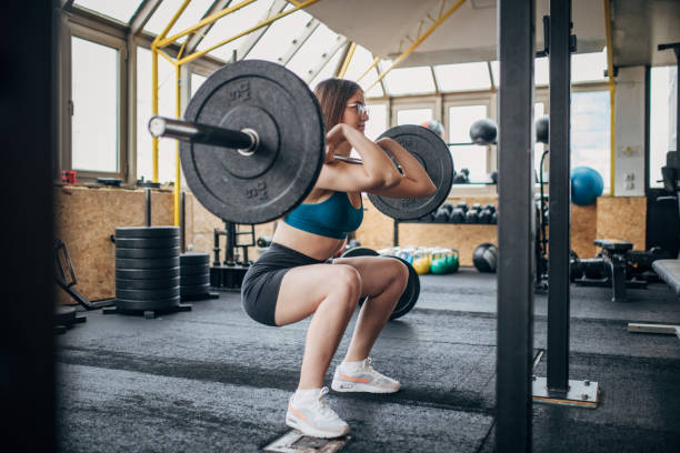 istock Woman weightlifting 1510844658
