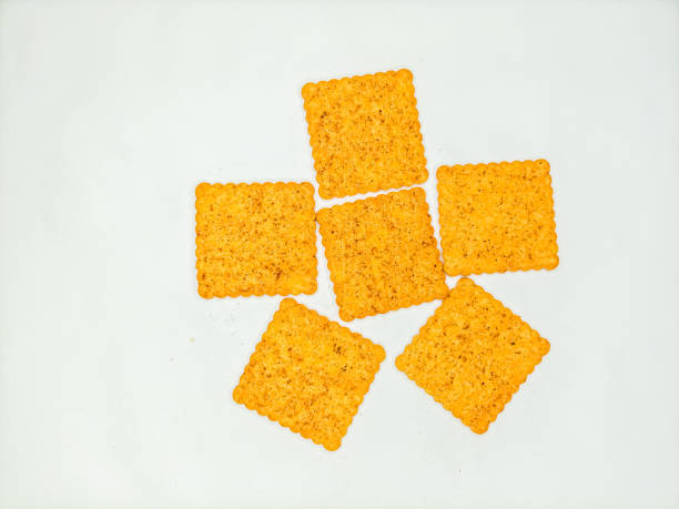 istock Yellow crunchy spicy cookies isolated on white background. 1510856004