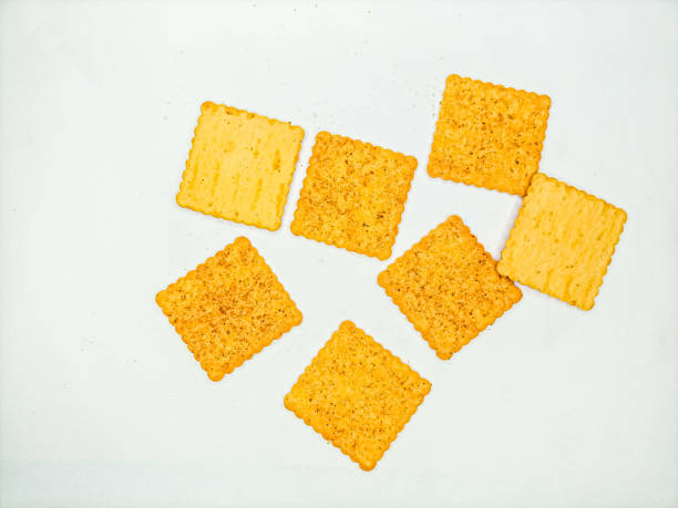 istock Yellow crunchy spicy cookies isolated on white background. 1510856773