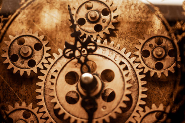 antique watch dial close-up. vintage clock measuring time. golden gear wheels with cogs. - watch gold blurred motion time imagens e fotografias de stock