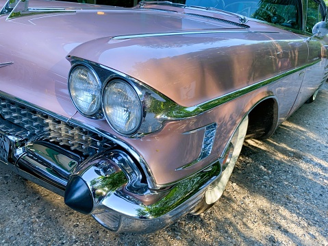 Moncton, New Brunswick, Canada - July 10, 2010 : Rear view of 1958 Cadillac Series 62 four door hard top at Annual Atlantic Nationals Automotive Extravaganza after a light rain in Centennial Park, Moncton, New Brunswick, Canada.