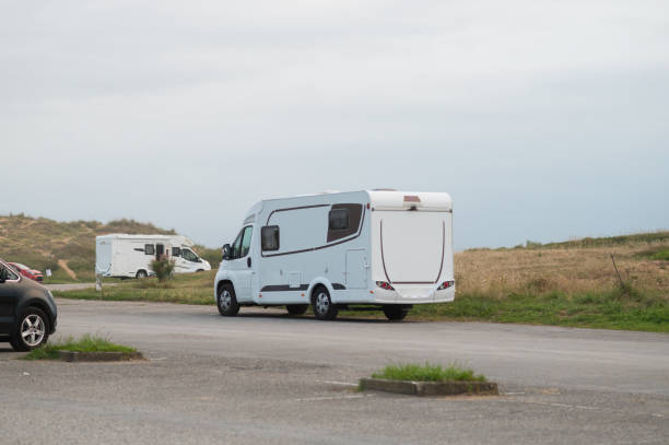 istock Camper van in a parking lot 1510909679