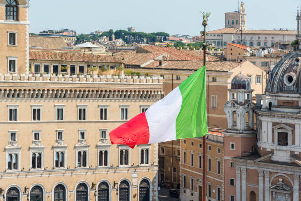 istock Italian flag on Piazza Venezia in Rome 1510921110