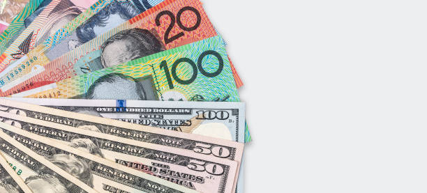 istock Australian dollars and US dollars on the table . 1510979098