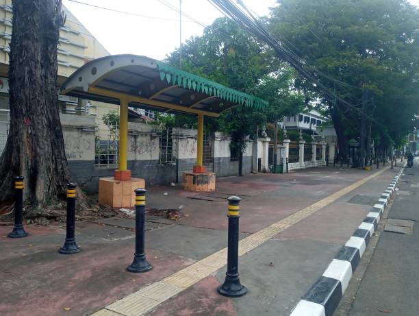 istock A simple and small bus stop in the morning.  Jakarta. 1511040032
