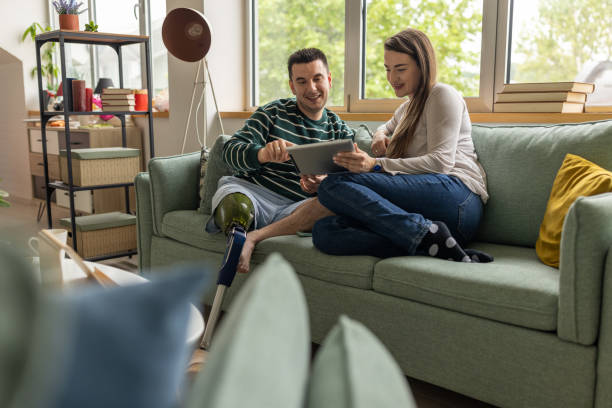 istock Young man and his friend using a tablet together at home 1511083913