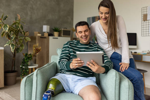 istock Young man and his friend using a tablet together at home 1511084447