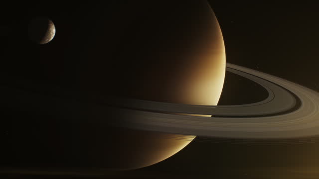 Realistic 3D graphics of sunlit Saturn and its moon