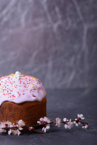 istock Freshly baked homemade Easter bread, natural dyed eggs and spring flowers. 1511110047