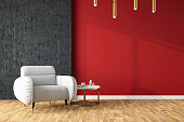 Modern Room Concept with an Armchair and Empty Red Wall