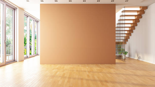 bútorozatlan nappali üres bézs fallal és lépcsővel - üres témájú stock jellegű vizuális alkotások, jogdíjmentes fotók és képek