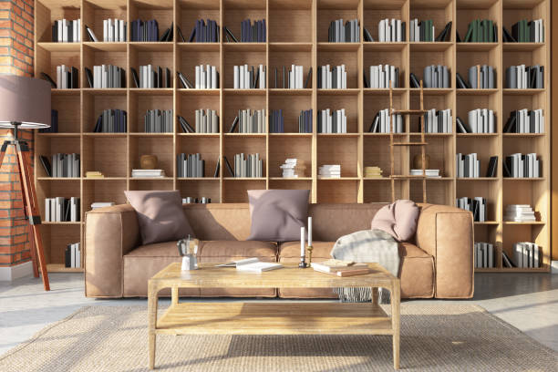 istock Cozy Living room with a Leather Sofa and a Library 1511127289