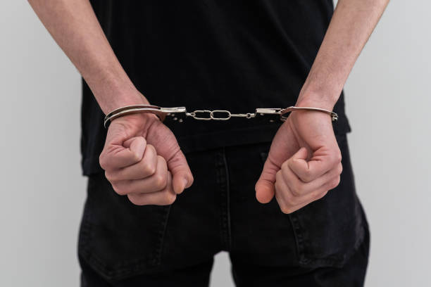istock Man's Hands In Handcuffs. criminal 1511151063