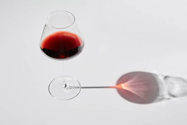 istock Red wine is in wineglass isolated on white background. 1511161706