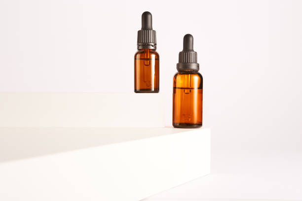 istock Dropper containers with pipettes on white background. 1511164981