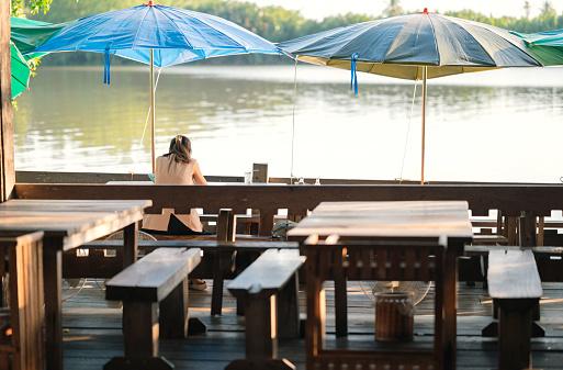 Pov asian women Eat seafood thai food original traditional food at river front Chachoengsao thailand