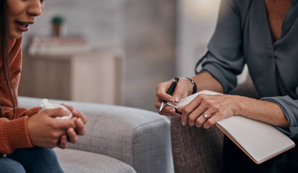 istock Crying, help and psychologist with a woman for therapy, depression notes and talking about trauma. Psychology, mental health and patient in counseling with a therapist writing the conversation 1511184354