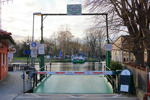 April 5 2023 - Caputh, Brandenburg in Germany: The cable ferry called Tussy 2 for cars and people connects Caputh and Geltow on the Havel waterway