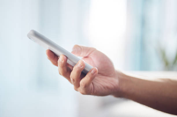 istock Closeup, mockup and hand with smartphone, typing and connection with communication, social media and texting. Zoom, hands and cellphone for online reading, search internet and information on website 1511190871