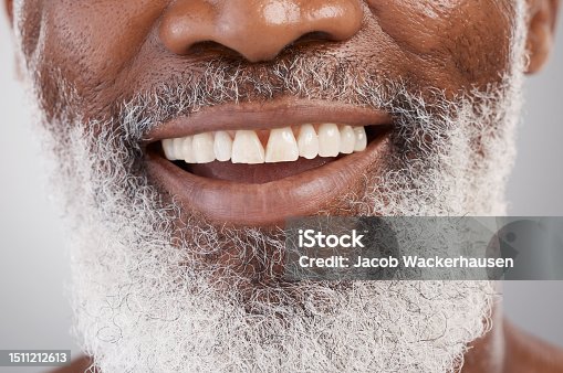 istock Mouth, teeth and beard with a senior man in studio on a gray background for beauty, skincare or grooming. Dentist, smile and happy with a person closeup for dental care, oral hygiene or whitening 1511212613