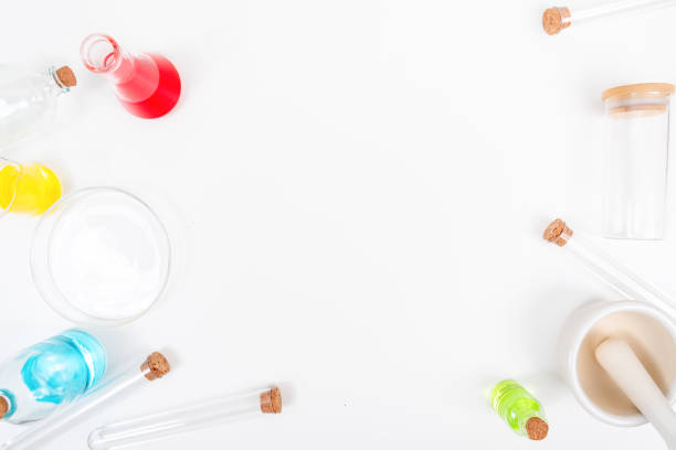 istock Top view science lab chemistry flask with beakers, flasks, and test tubes filled with colorful liquids 1511227558