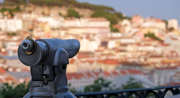 istock Viewpoint in Lisbon with selective focus on a telescope 1511237152