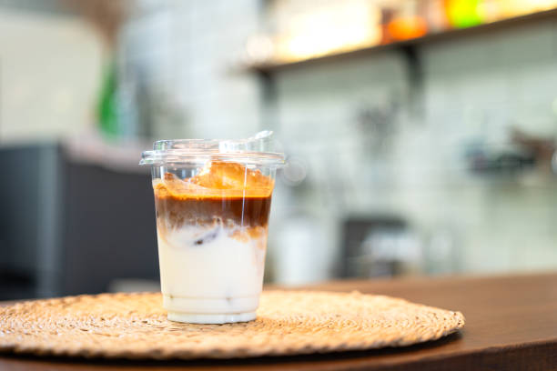 istock A cup of iced milk coffee on counter. 1511245812
