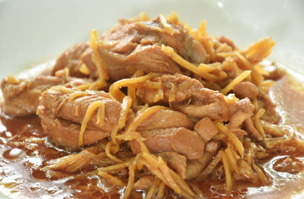 istock stir fried spicy chicken with slice ginger in soy sauce 1511254368