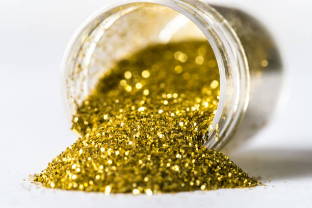 istock Gold Glitter Spilled from a Jar 1511279577