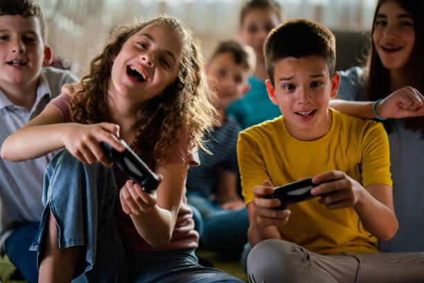 istock Children playing video games at home 1511282201