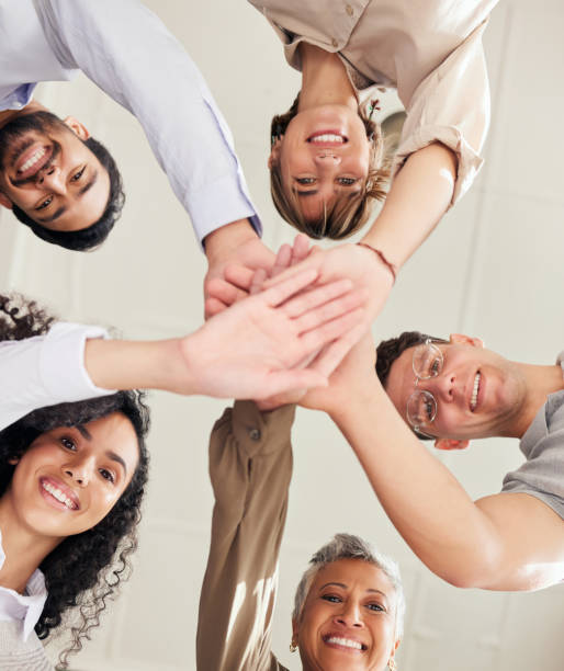 istock Hands stacked, teamwork and people portrait in support, collaboration or team building mission from below. Group, circle or business women and men, together hand sign and happy goals with diversity 1511282930