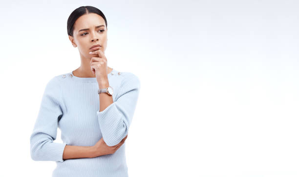 istock Thinking, mockup and a woman with a difficult decision isolated on a white background in a studio. Doubt, confused and a corporate employee looking thoughtful about business with space on a backdrop 1511297964