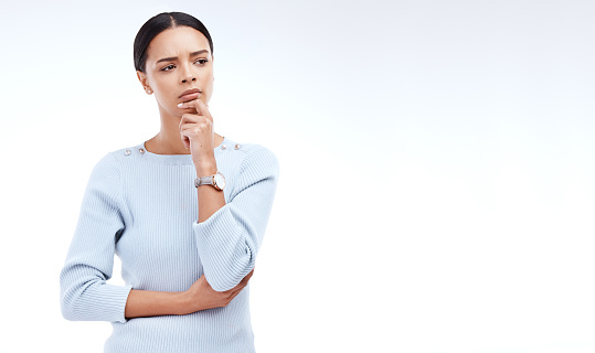Thinking, mockup and a woman with a difficult decision isolated on a white background in a studio. Doubt, confused and a corporate employee looking thoughtful about business with space on a backdrop