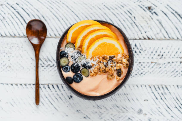 istock Fruit  Orange Smoothie bowl and Granola 1511308677
