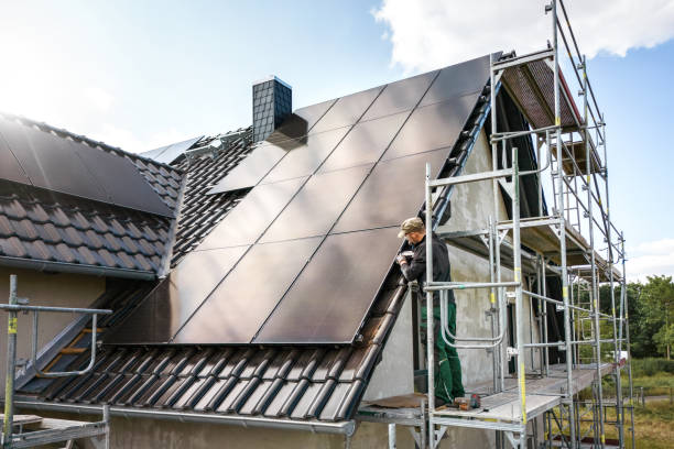 istock Technician working on a solar panel at a construction site of a single family house 1511311091