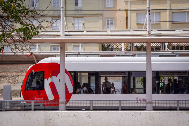 Subway Train Trolley Stopped at the Station with Passengers Boarding Public Transportation. Metrovalencia Pont de Fusta Stop