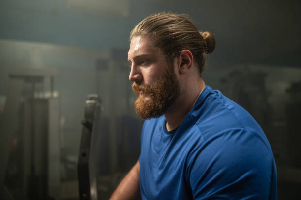 istock Male Athlete Sitting In Gym 1511319568