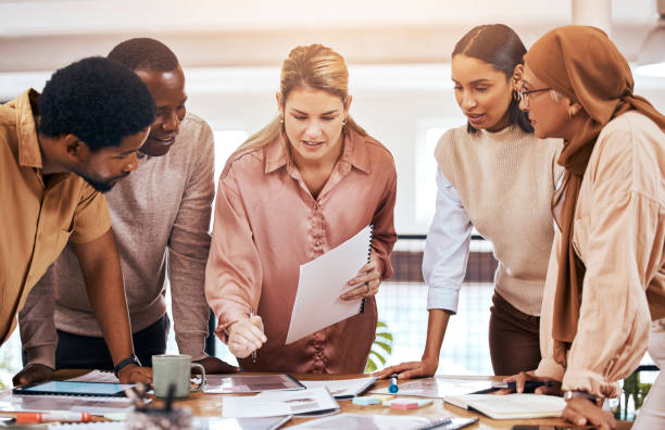 istock Planning, strategy and business people teamwork, ideas and brainstorming with documents for management meeting. Workflow, portfolio or paperwork of diversity employees, woman manager and startup talk 1511332366