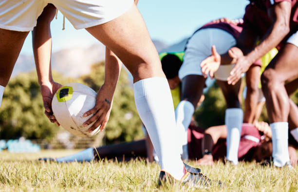 Ball, scrum or hands of rugby men in training, exercise or workout match on sports field in practice. Team work, strong man or powerful group in tough competitive game with physical fitness or effort pelota, scrum o manos de hombres de rugby en entrenamiento, ejercicio o partido de entrenamiento en campo deportivo en la práctica. trabajo en equipo, hombre fuerte o grupo poderoso en un juego competitivo duro con aptitud física o esfuerzo