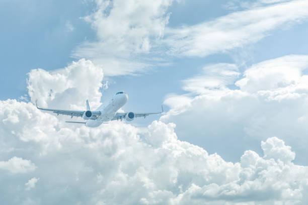 istock Large airplane flying in clear sky 1511339491